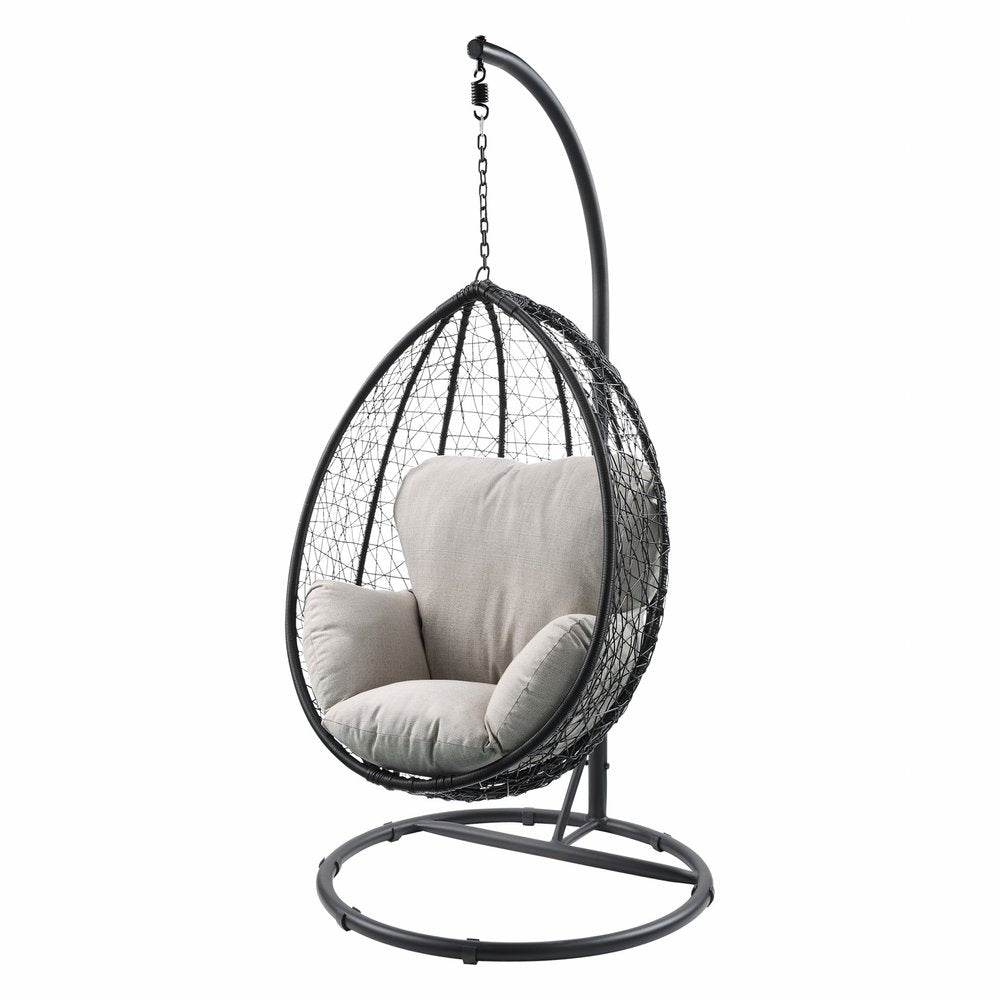 Sillón columpio de metal negro de 38" con cojín beige