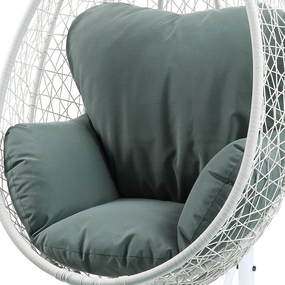 Sillón columpio de metal negro de 38" con cojín beige