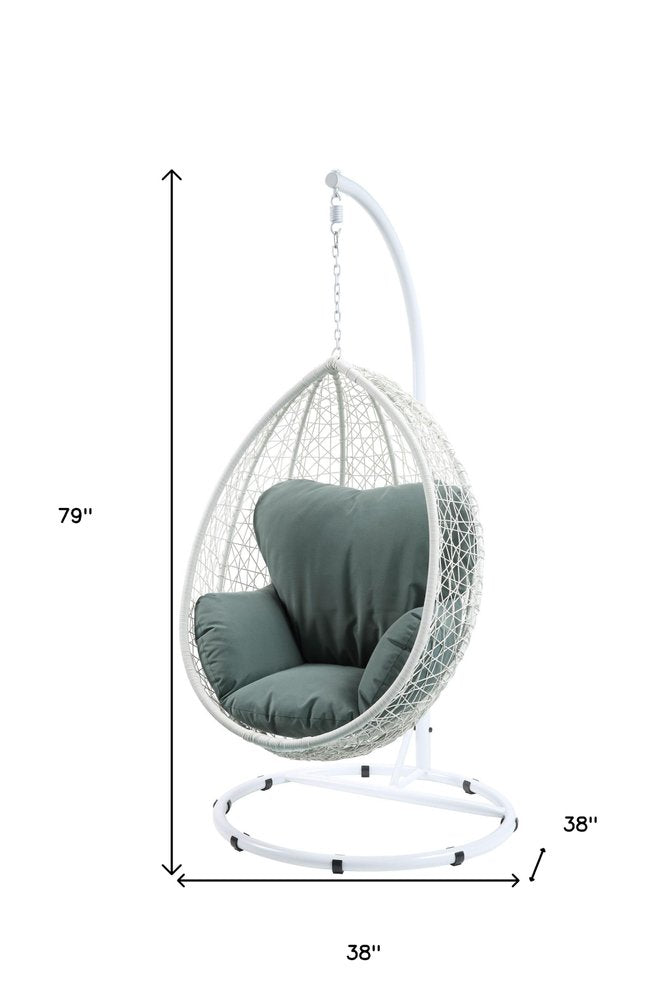 Sillón columpio de metal negro de 38" con cojín beige