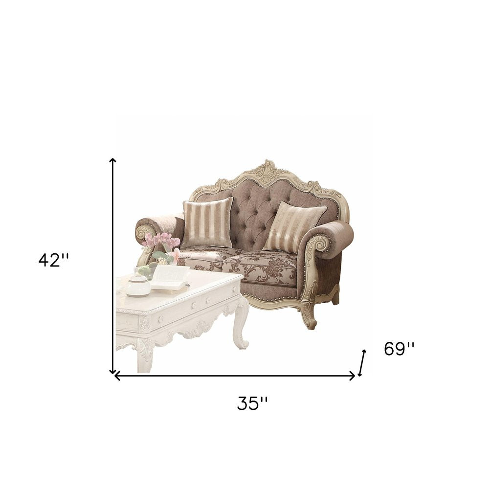 Loveseat Chesterfield de 69" con cojines decorativos en gris y blanco roto
