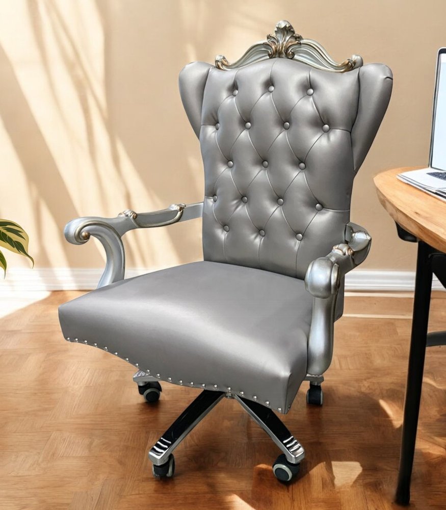Silla ejecutiva giratoria ajustable con asiento capitoné de cuero sintético gris y respaldo de cuero