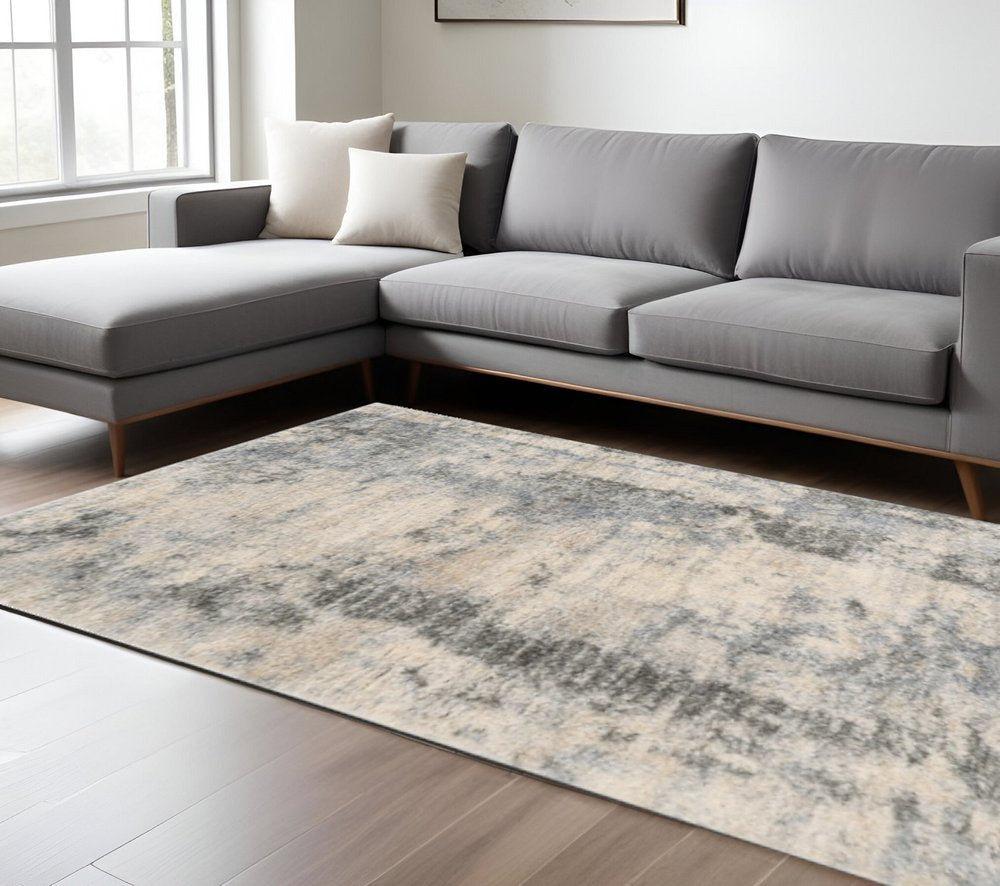 9' X 13' Ivory And Blue Abstract Area Rug