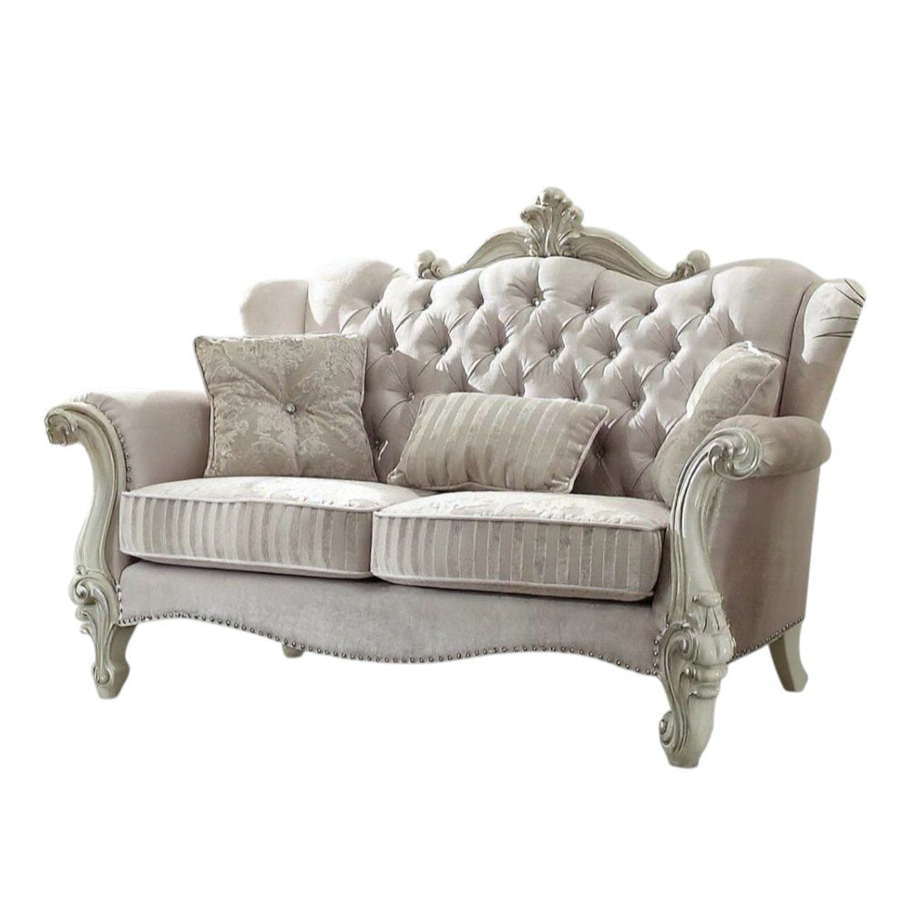 Loveseat curvo de piel sintética color hueso y dorado de 70"