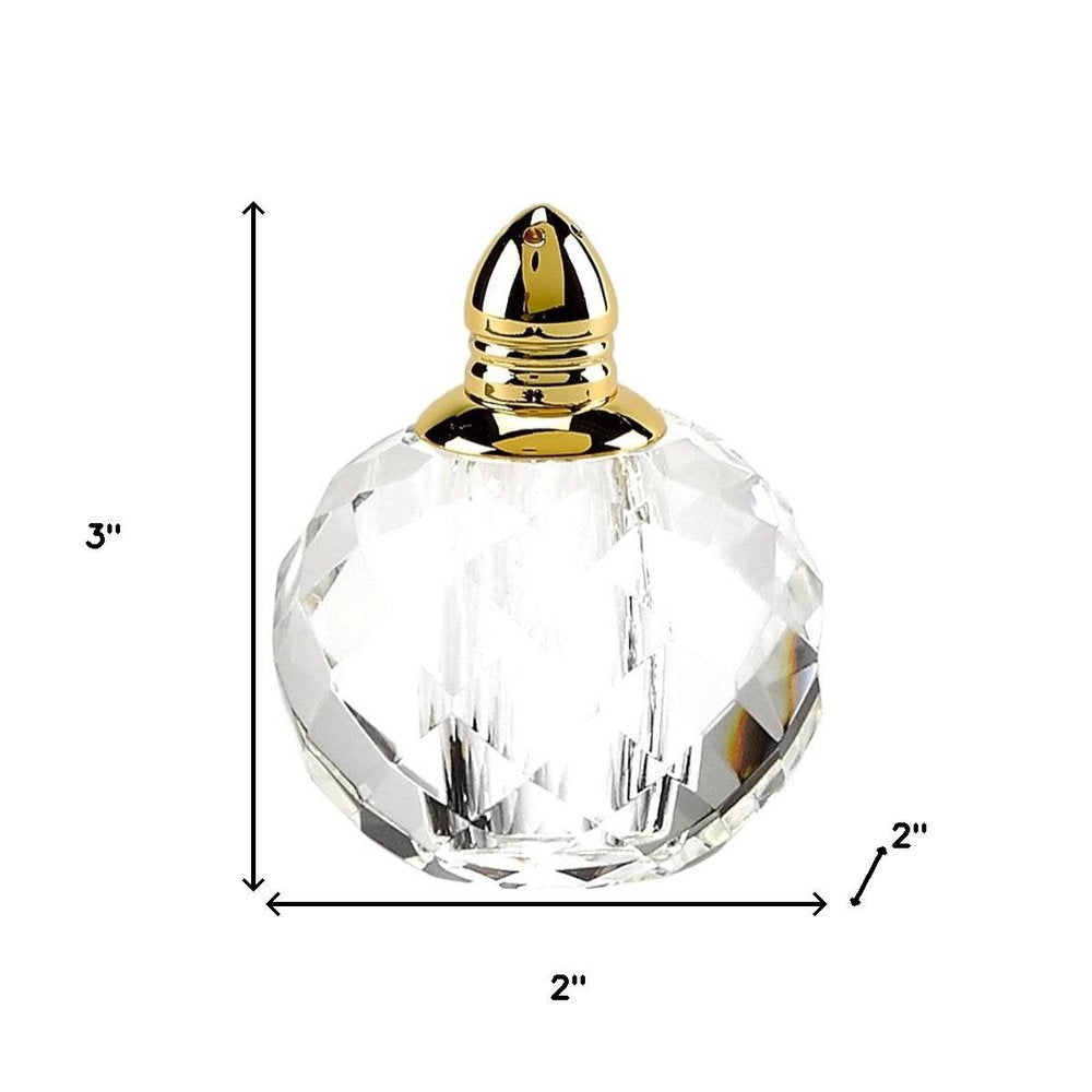 Juego de dos pimenteros geométricos de cristal transparente y dorado