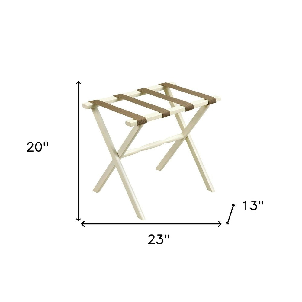 Portaequipajes plegable de madera con acabado marfil y correas color canela para hotel