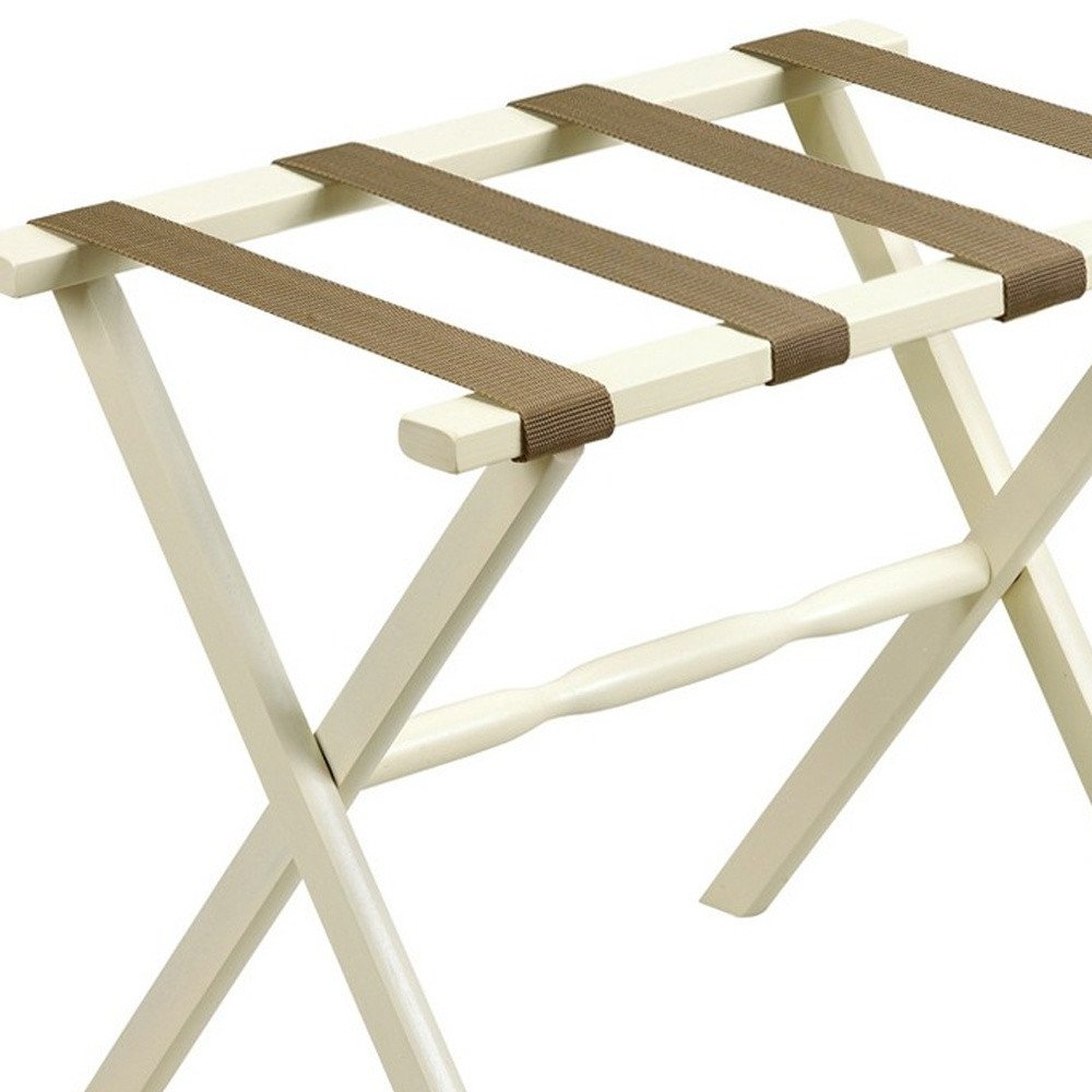 Portaequipajes plegable de madera con acabado marfil y correas color canela para hotel