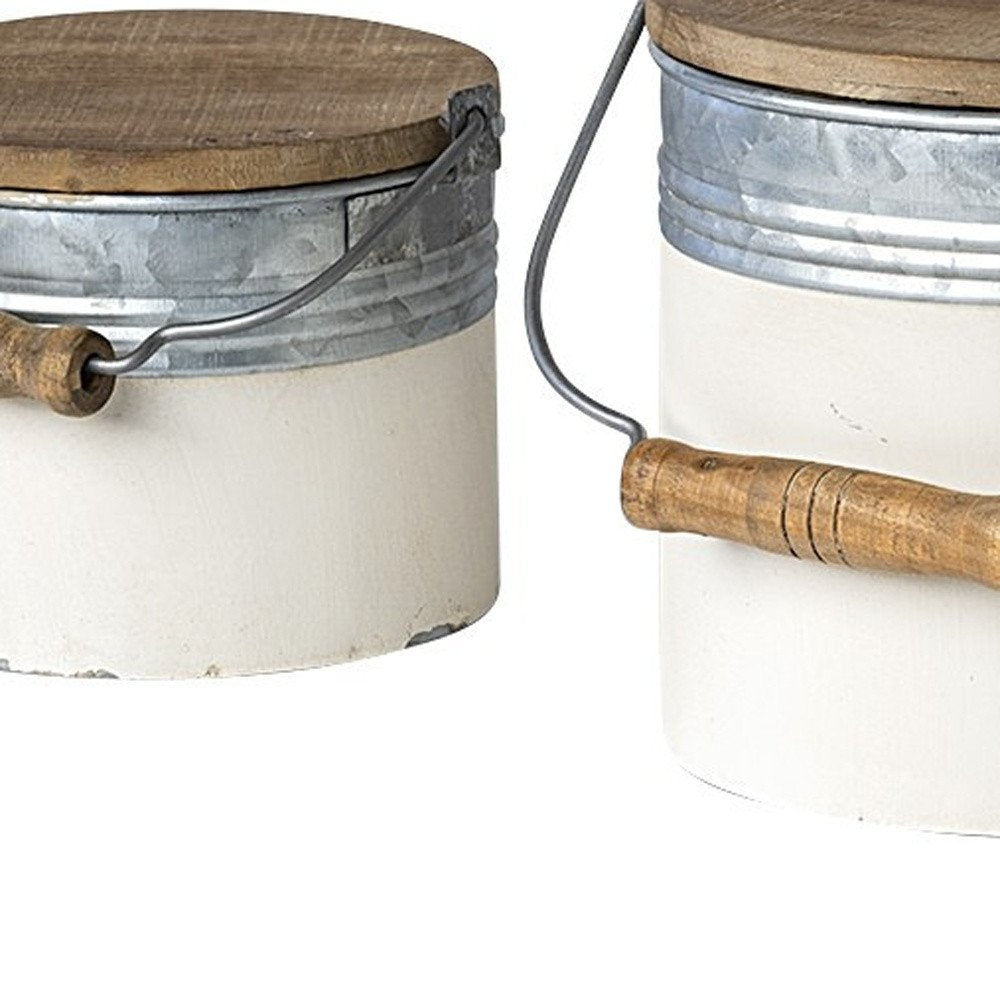 Juego de tres latas de almacenamiento rústicas de metal blanco