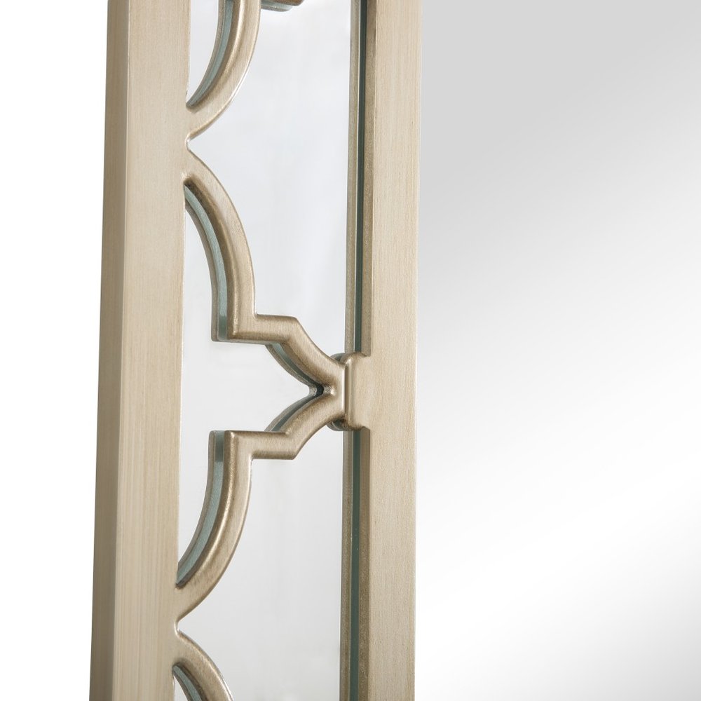 Espejo decorativo con marco de metal color champán de 44"