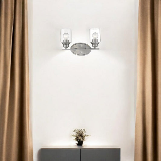 Aplique de pared plateado de dos luces con pantalla de cristal transparente