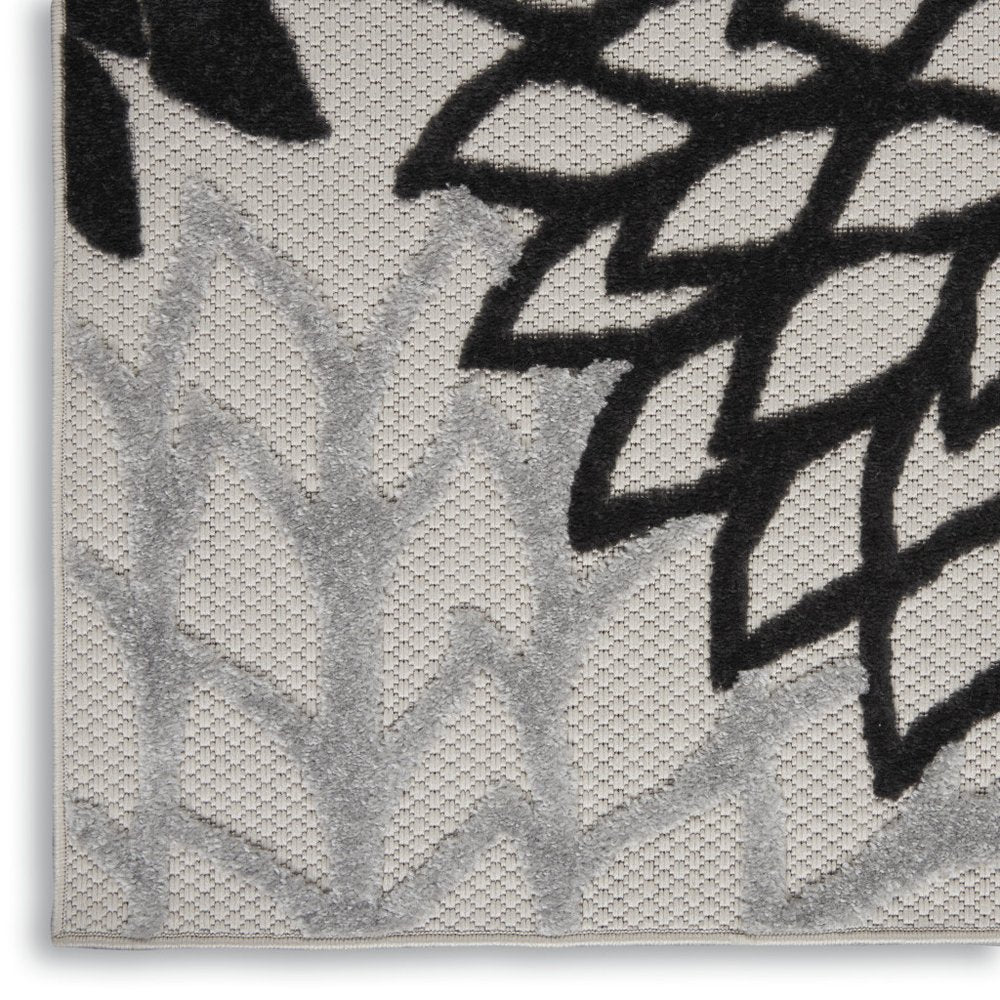 10' Black And White Indoor Outdoor Runner Rug