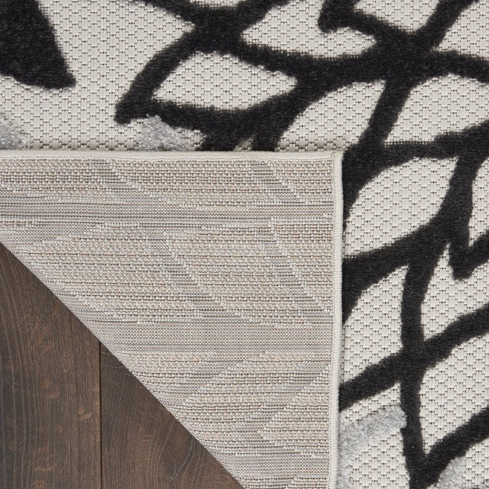 10' Black And White Indoor Outdoor Runner Rug