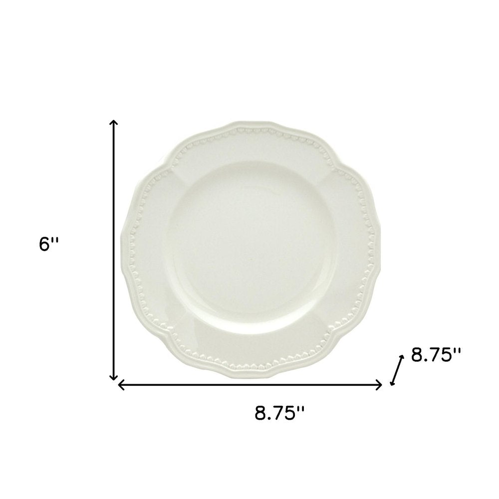 Juego de cuatro platos de ensalada de cerámica blanca redonda con diseño festoneado para cuatro personas