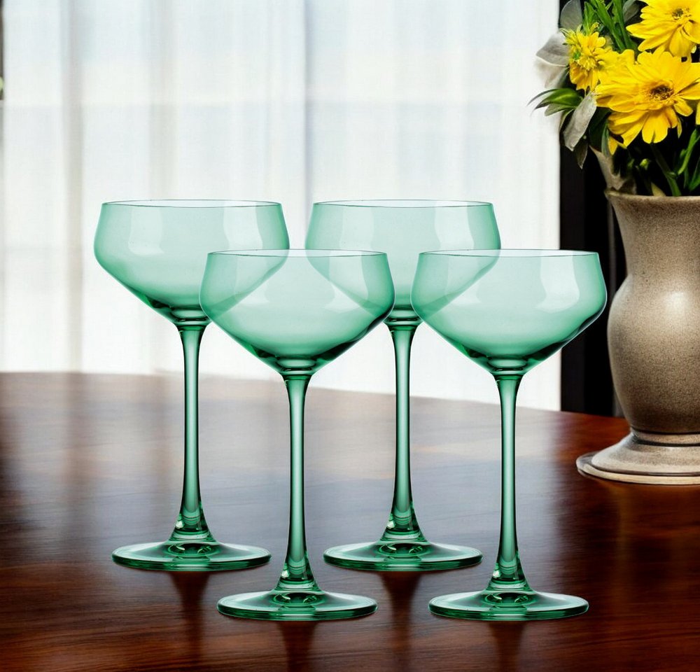 Juego de cuatro cuencos de cristal verde poco profundos con tallo cupé