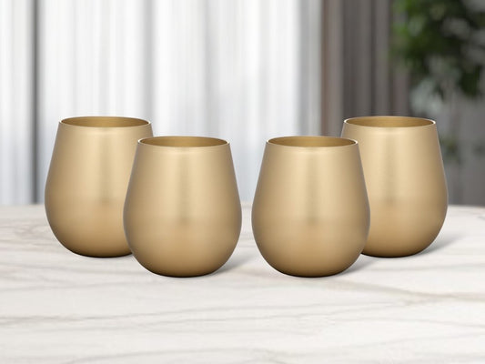 Juego de cuatro copas de vino multiusos sin tallo de acrílico dorado