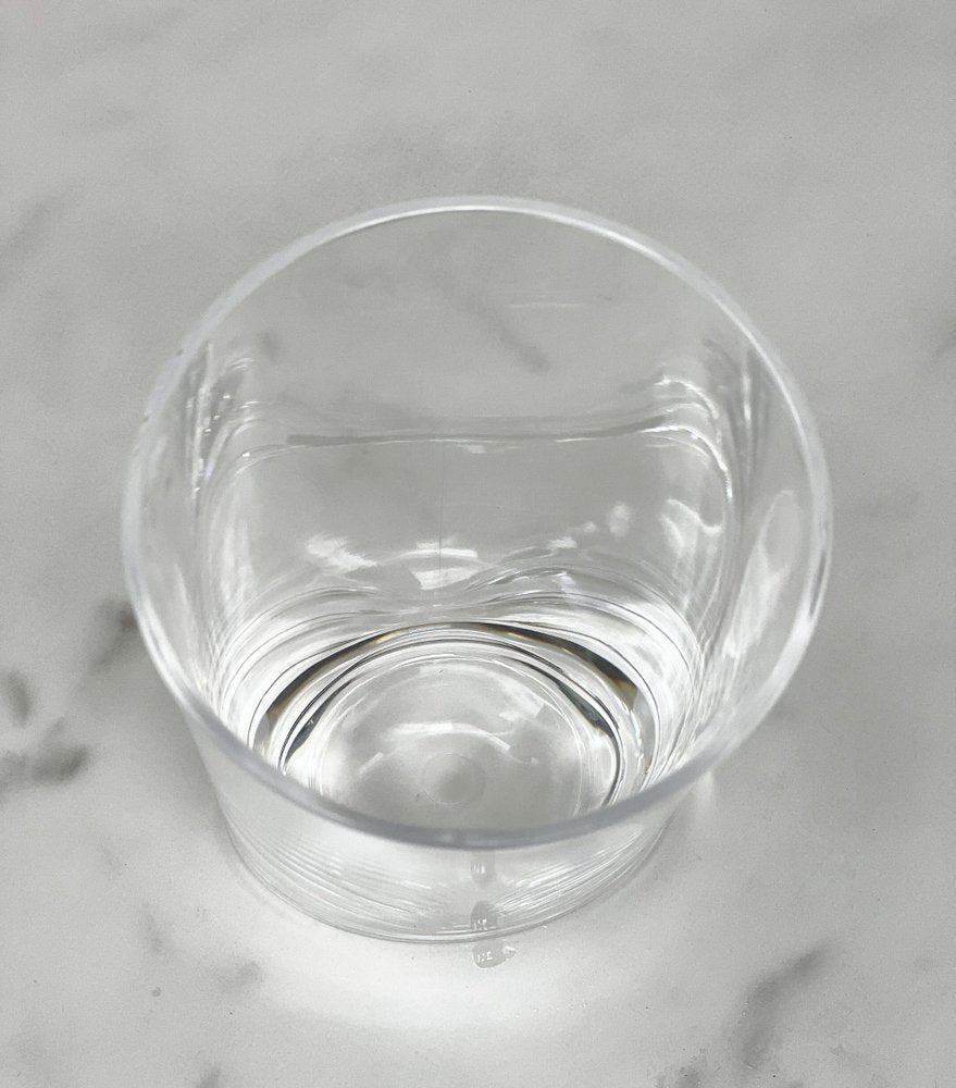 Juego de cuatro vasos de whisky sin tallo de acrílico transparente