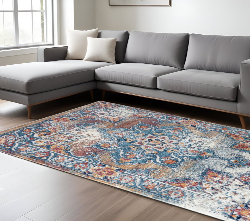9' X 12' Ivory Blue And Orange Medallion Area Rug