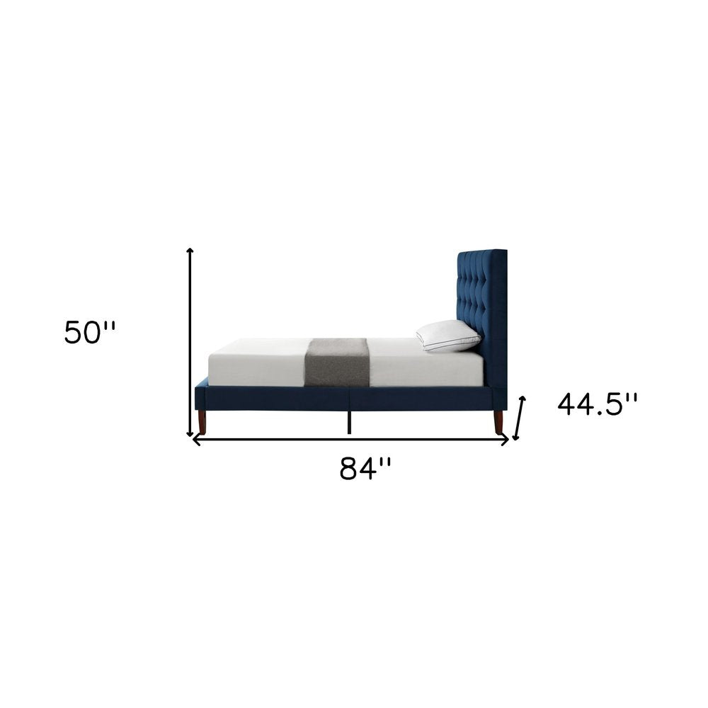 Cama individual de madera maciza azul marino con tapizado de terciopelo capitoné