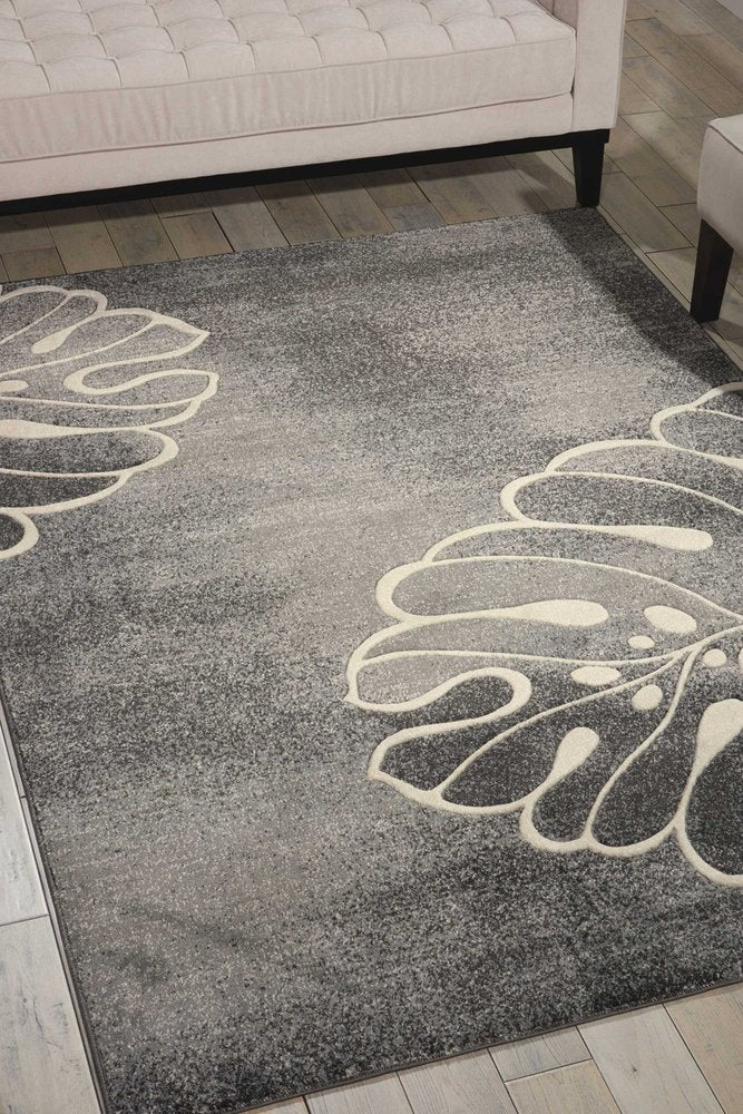 9' X 13' Ivory Black and Gray Botanical Leaves Non Skid Area Rug