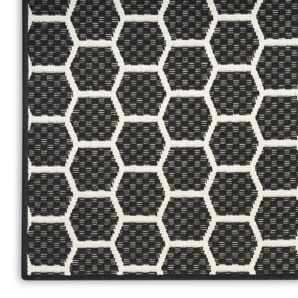 10' Black And Ivory Geometric Indoor Outdoor Runner Rug