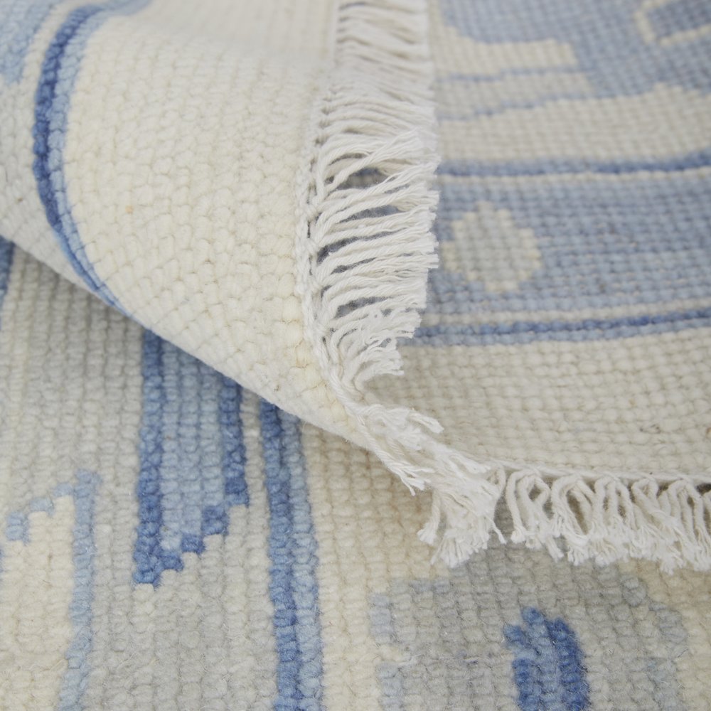 9' X 13' Ivory and Blue Wool Floral Hand Knotted Area Rug With Fringe