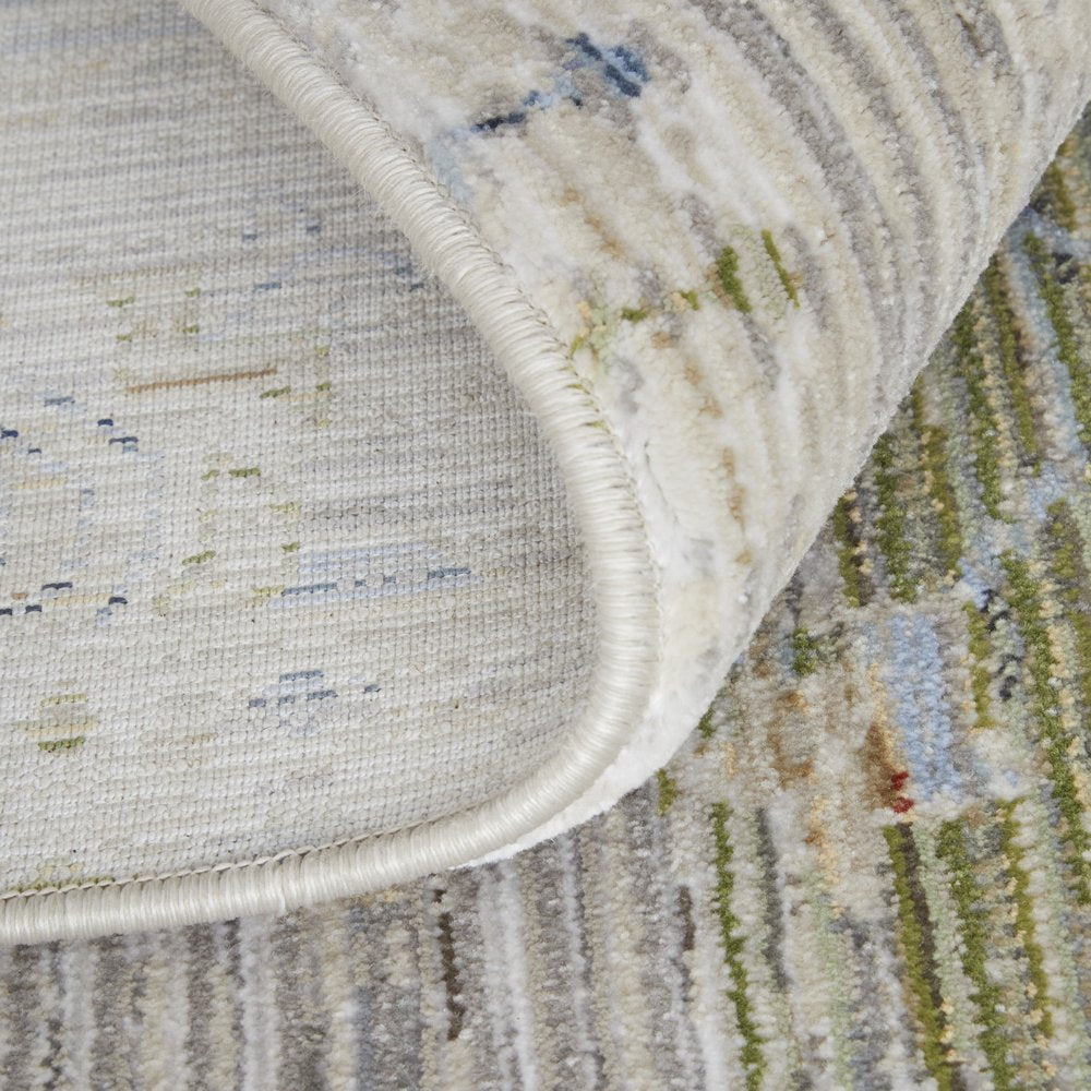 9' X 13' Ivory Green and Blue Abstract Power Loom Worn Faded Area Rug