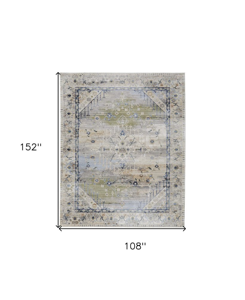 9' X 13' Ivory Green and Blue Abstract Power Loom Worn Faded Area Rug
