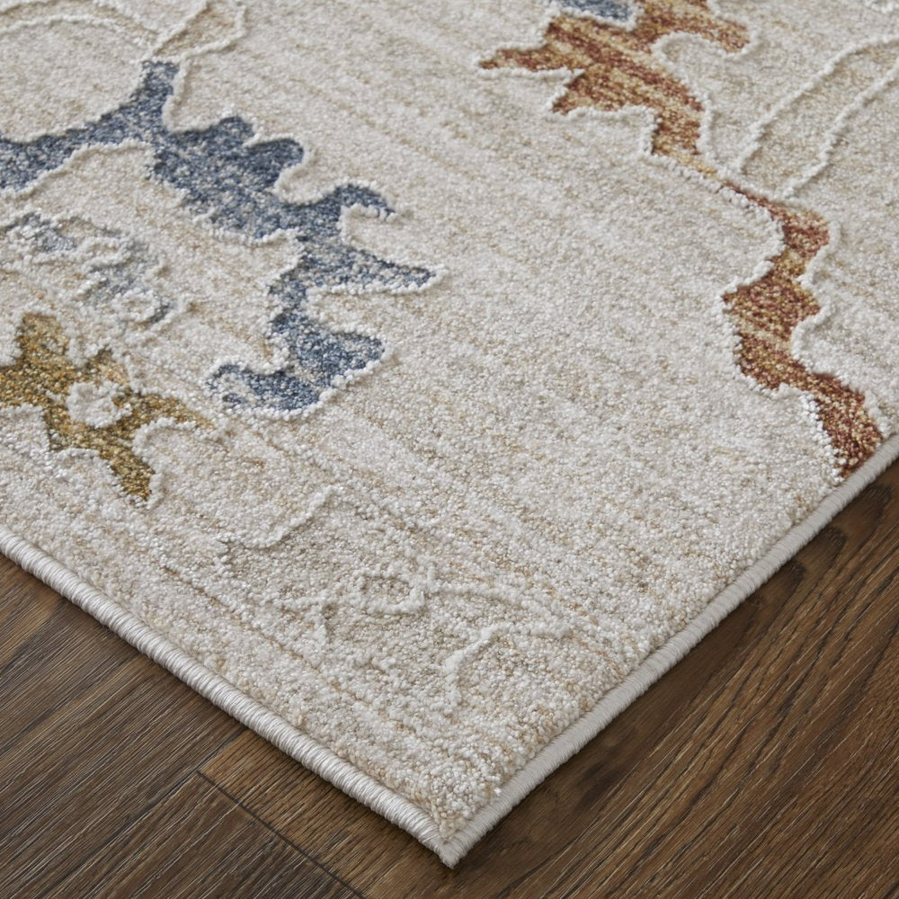 9' X 13' Ivory Blue and Gold Floral Power Loom Worn Faded Area Rug With Fringe