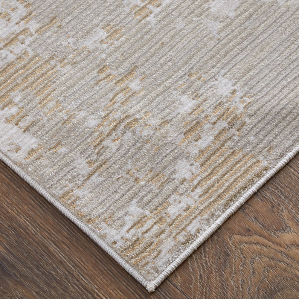 9' X 13' Gray Brown and Ivory Abstract Power Loom Area Rug