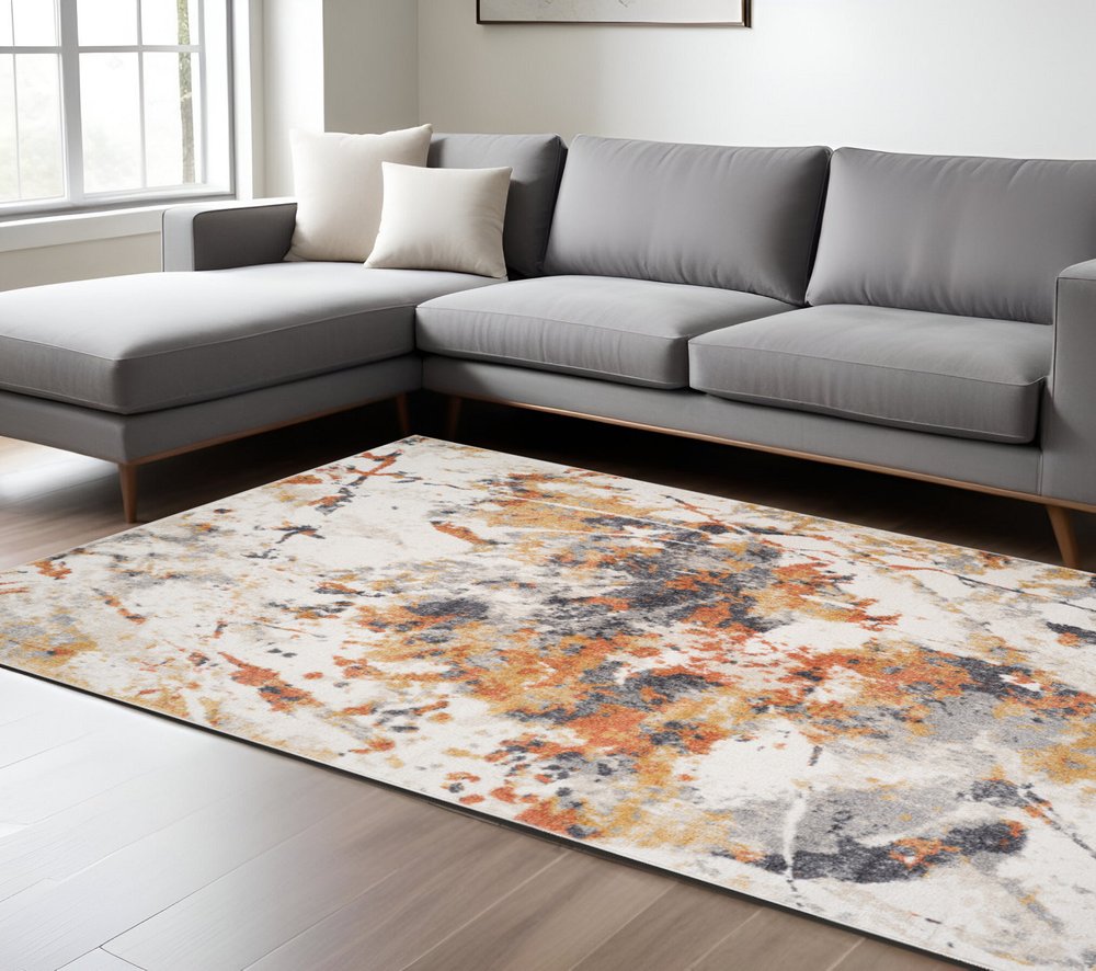 9' X 12' Ivory Orange And Gray Abstract Area Rug
