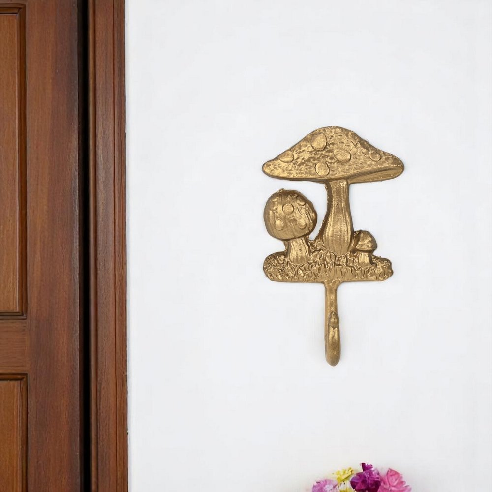 Gancho de pared con forma de hongo de hierro fundido dorado de 4"