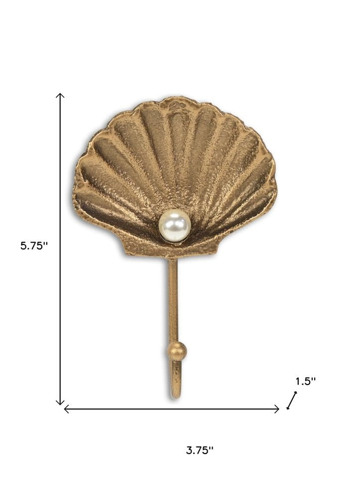 Gancho de pared de hierro fundido dorado de 4" con forma de concha marina