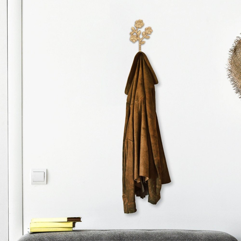 Gancho de pared con forma de flor de hierro fundido dorado envejecido de 4"