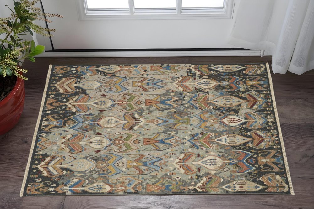 9' X 13' Blue Gray And Brown Ikat Hand Knotted Area Rug With Fringe