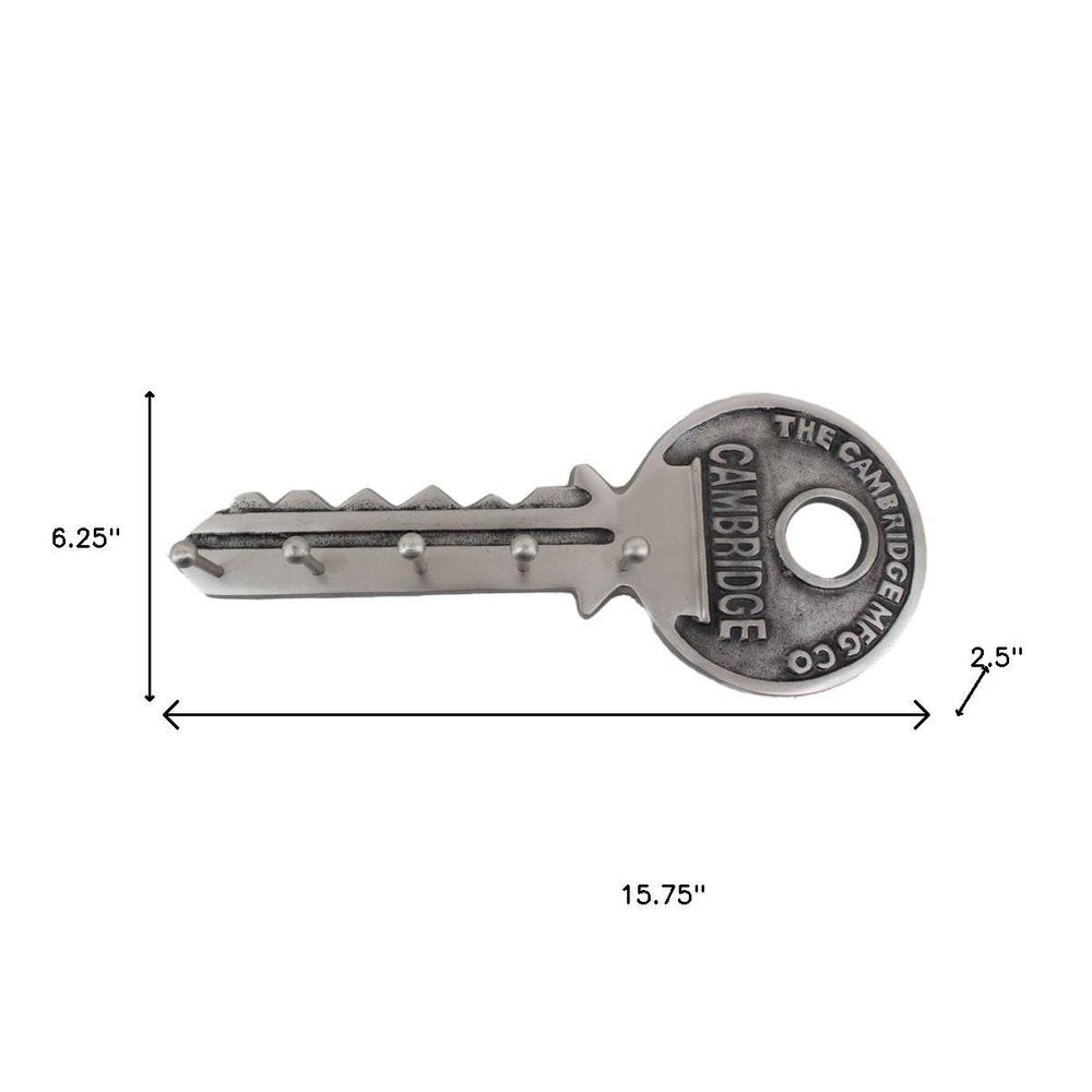 Perchero de pared plateado de 16" con cinco ganchos y forma de llave
