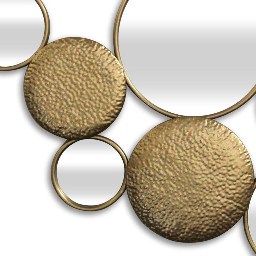 Espejo decorativo de pared de 37" de metal dorado y vidrio espejado