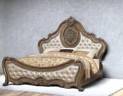 Cama Queen con capitoné de piel sintética tapizada en bronce y ribete de tachuelas