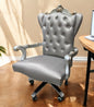 Silla ejecutiva giratoria ajustable con asiento capitoné de cuero sintético gris y respaldo de cuero