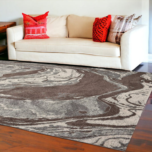 9' X 13' Brown And Ivory Abstract Area Rug