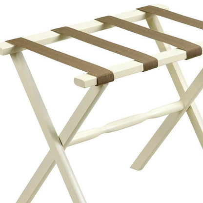 Portaequipajes plegable de madera con acabado marfil y correas color canela para hotel