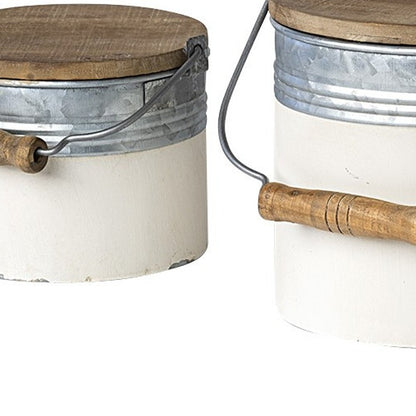 Juego de tres latas de almacenamiento rústicas de metal blanco