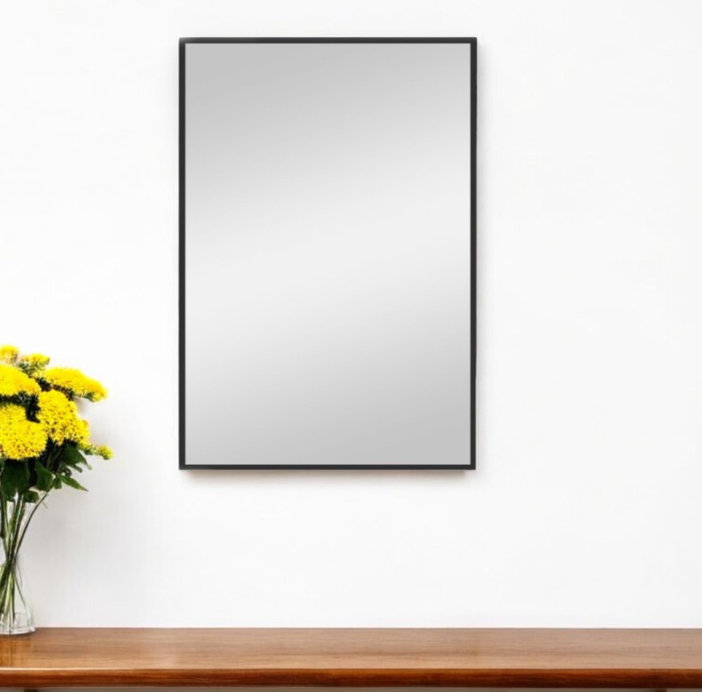 Espejo decorativo con marco de metal negro de 38"