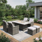 Nine Piece Gray Wicker Multiple Chairs Seating Group With Fire Pit And Table