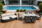 Nine Piece Gray Wicker Multiple Chairs Seating Group With Fire Pit And Table