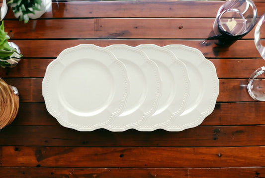 Juego de cuatro platos de ensalada de cerámica blanca redonda con diseño festoneado para cuatro personas