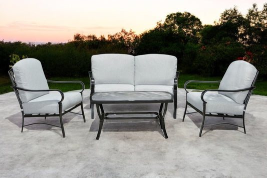 Four Piece Black and Light Gray Metal Outdoor Patio Set With Table