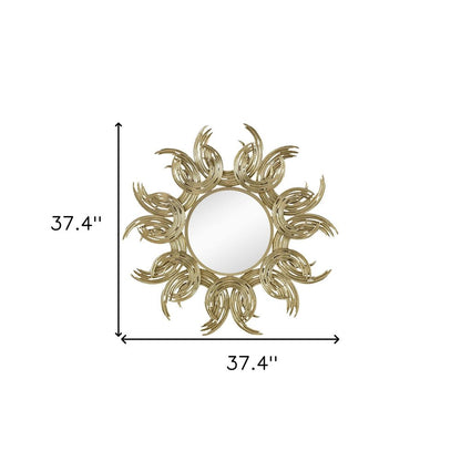 Espejo decorativo abstracto dorado con marco de hierro y diseño de rayos de sol de 37"