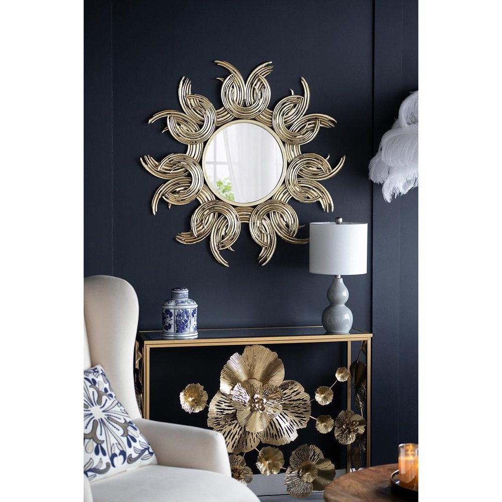 Espejo decorativo abstracto dorado con marco de hierro y diseño de rayos de sol de 37"
