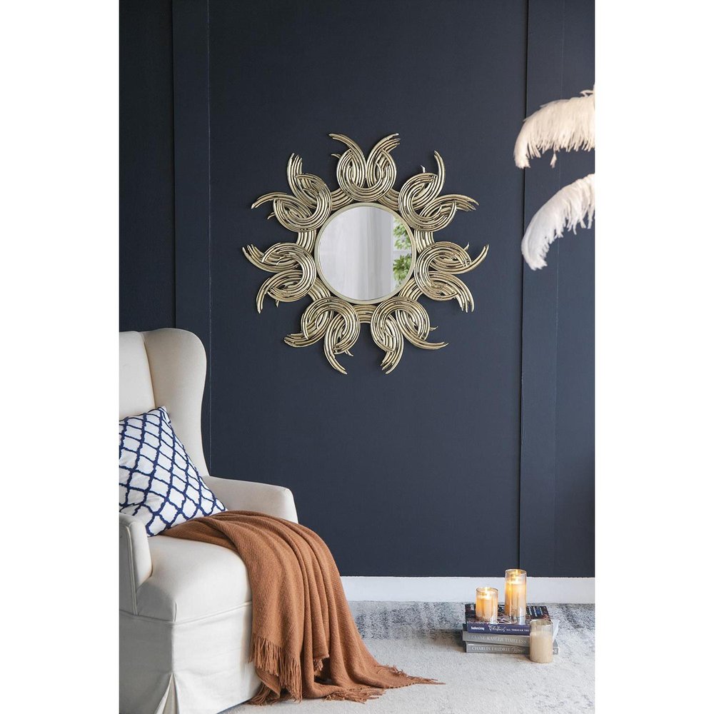 Espejo decorativo abstracto dorado con marco de hierro y diseño de rayos de sol de 37"