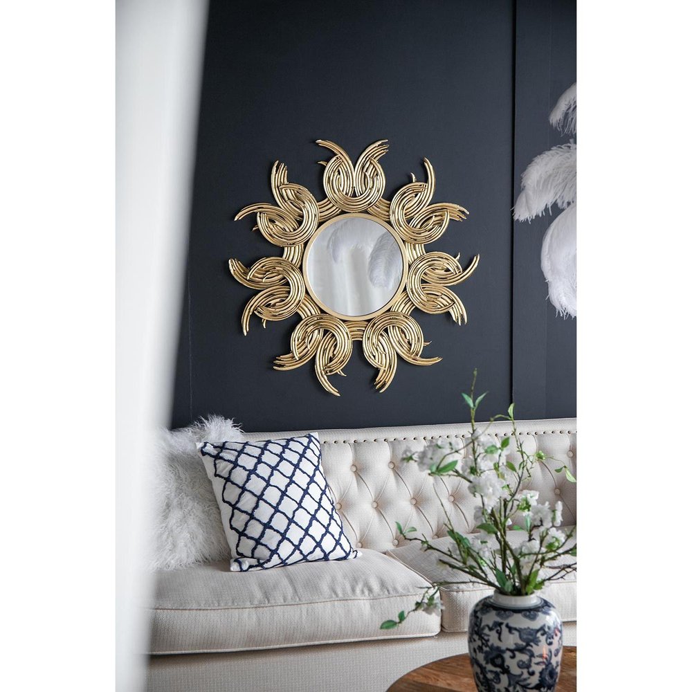 Espejo decorativo abstracto dorado con marco de hierro y diseño de rayos de sol de 37"