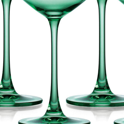 Juego de cuatro cuencos de cristal verde poco profundos con tallo cupé